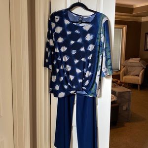Two piece print top in blues and blue flare pant. Very  versatile and comfy.